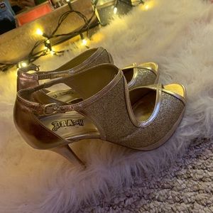 Gold sparkly high heels